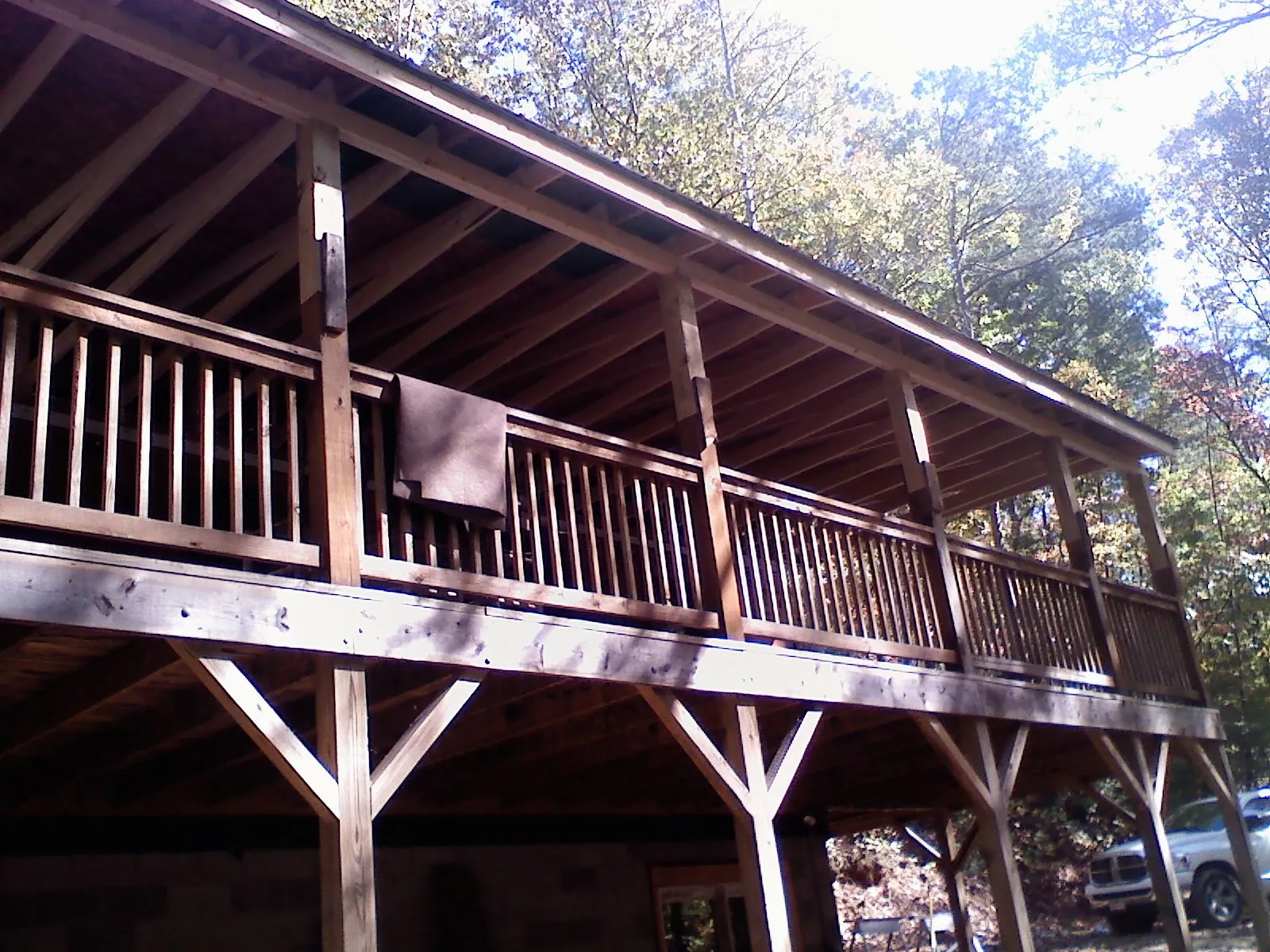 Timber framing under a new elevated porch and deck — Roof Leak Repair in Glenmont by Roofing Brothers